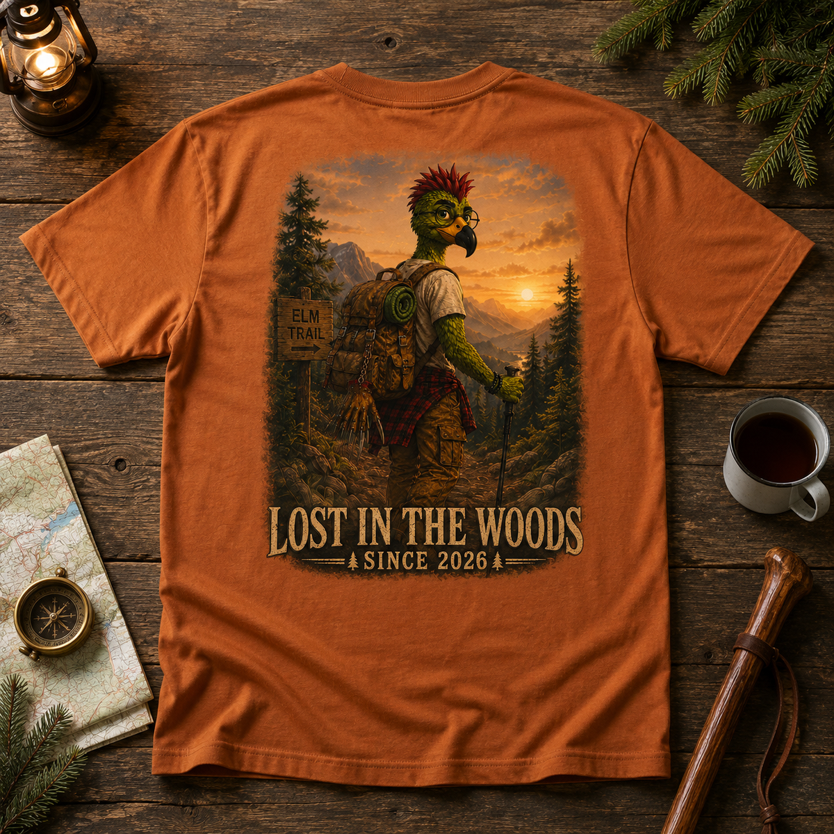 Staged tabletop view of the Autumn Albie’s Elm Trail T-shirt back design