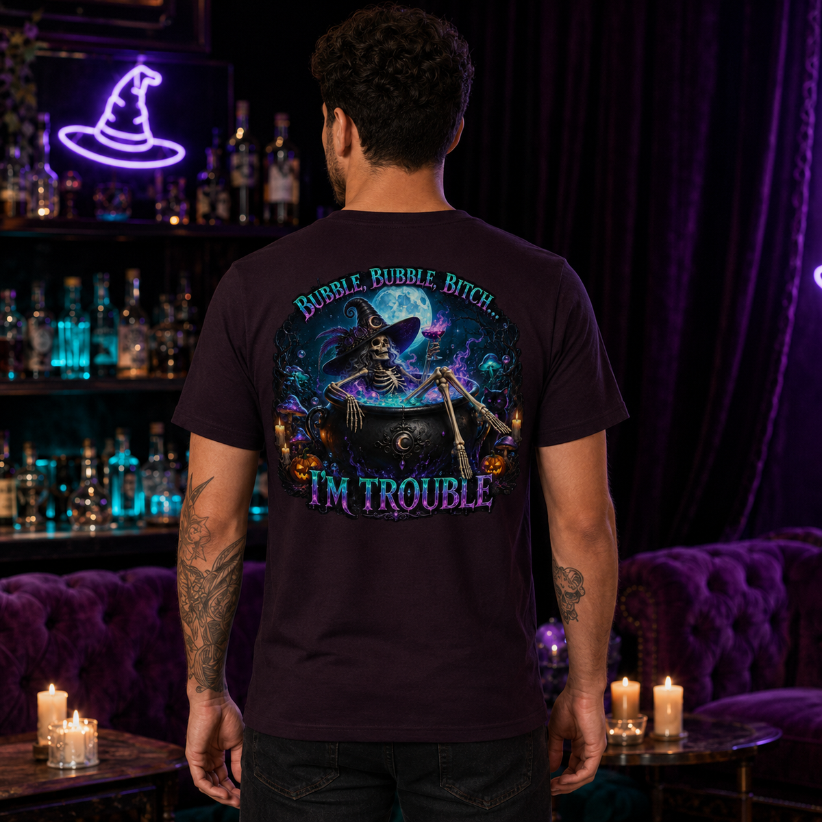 Male model wearing the Oxblood Black Bubble Bubble unisex graphic T-shirt with full witch back design