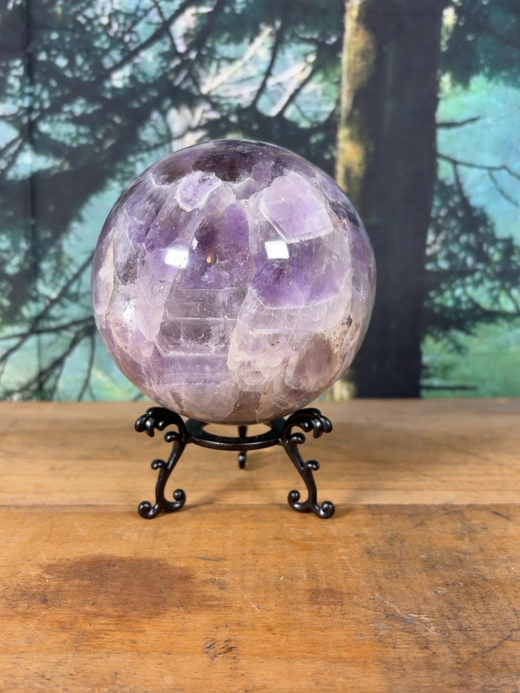 Dream amethyst crystal sphere with layered chevron pattern – view 3