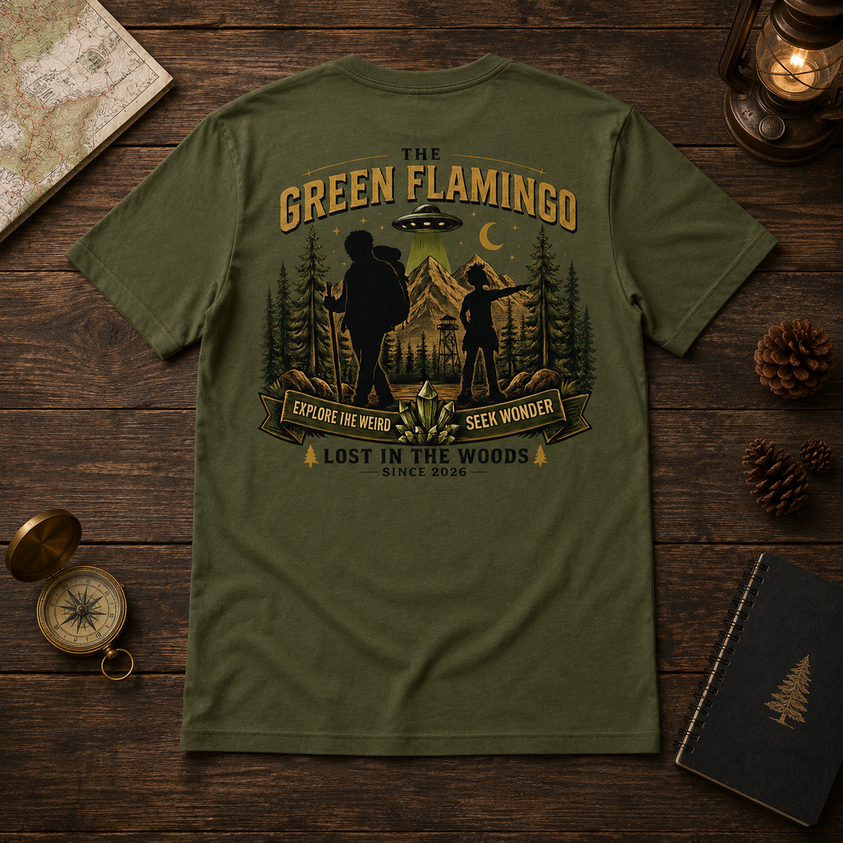 Olive Explore the Weird Seek Wonder shirt back design in expedition flat lay