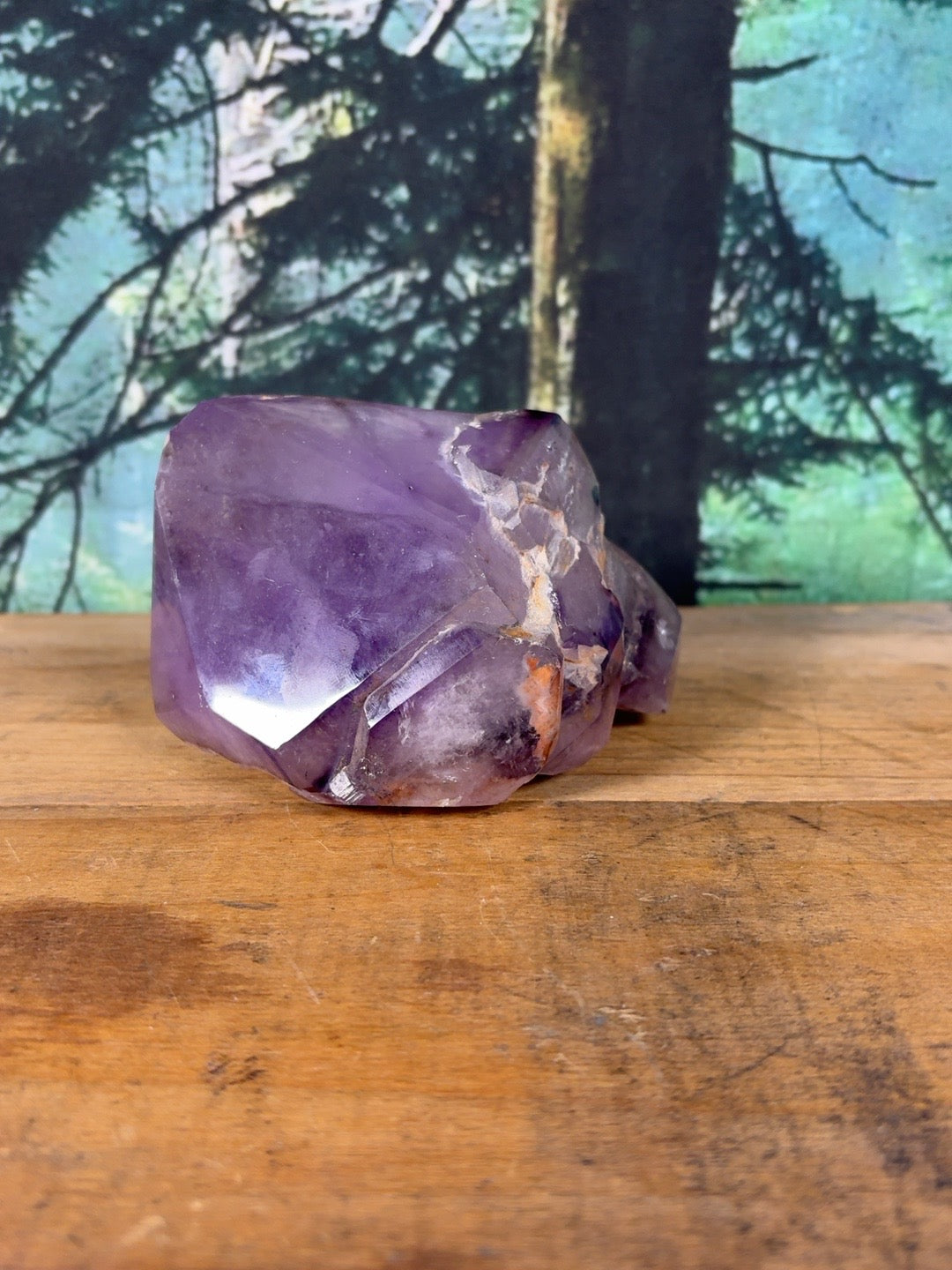 Amethyst multi-point cluster showing intergrown terminations and mineral matrix
