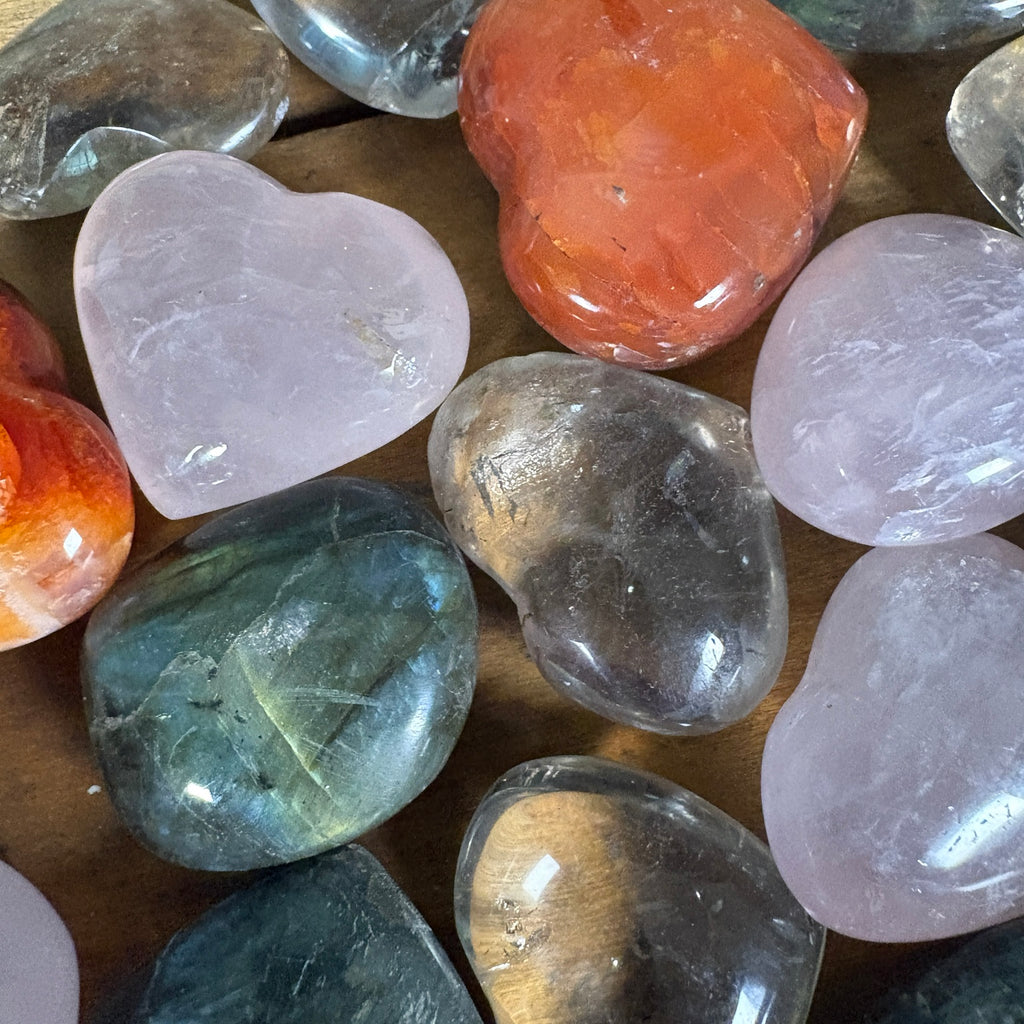 Mixed gemstone heart carvings including rose quartz labradorite and carnelian