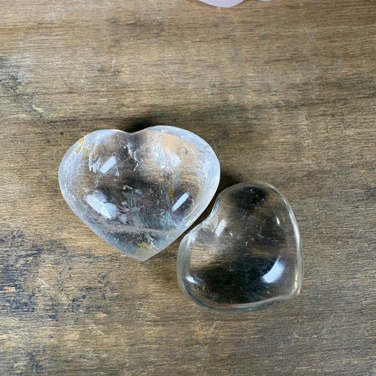 Clear quartz and smoky quartz polished crystal hearts
