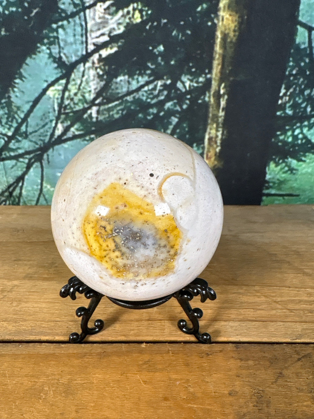 Blush cream Ocean Jasper sphere with mustard yellow orb front view