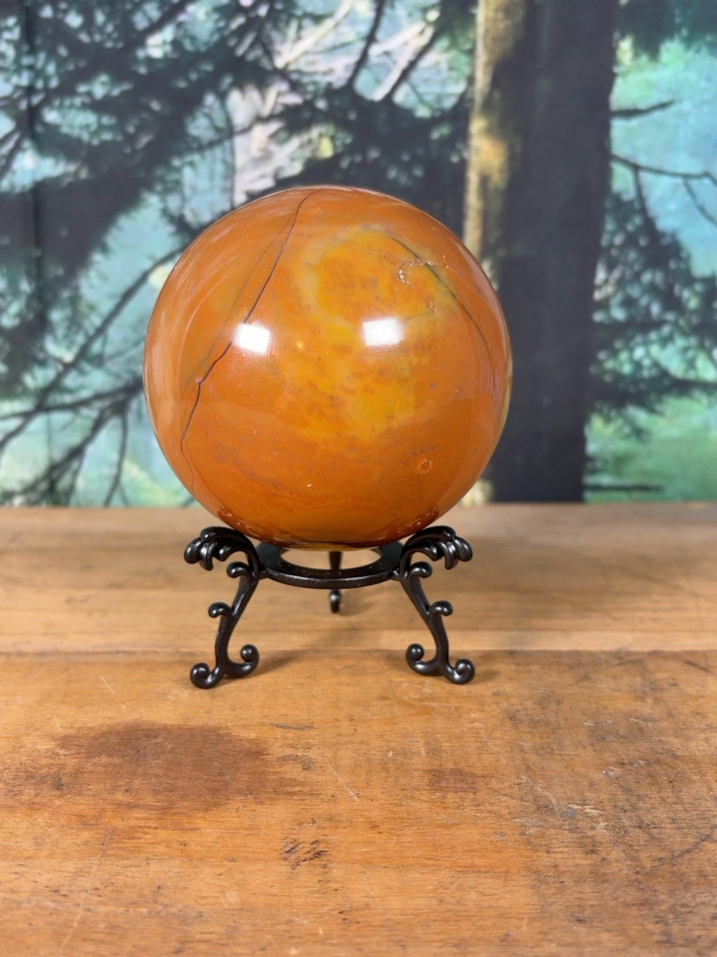 Large Polychrome Jasper sphere showing yellow orb and natural veining