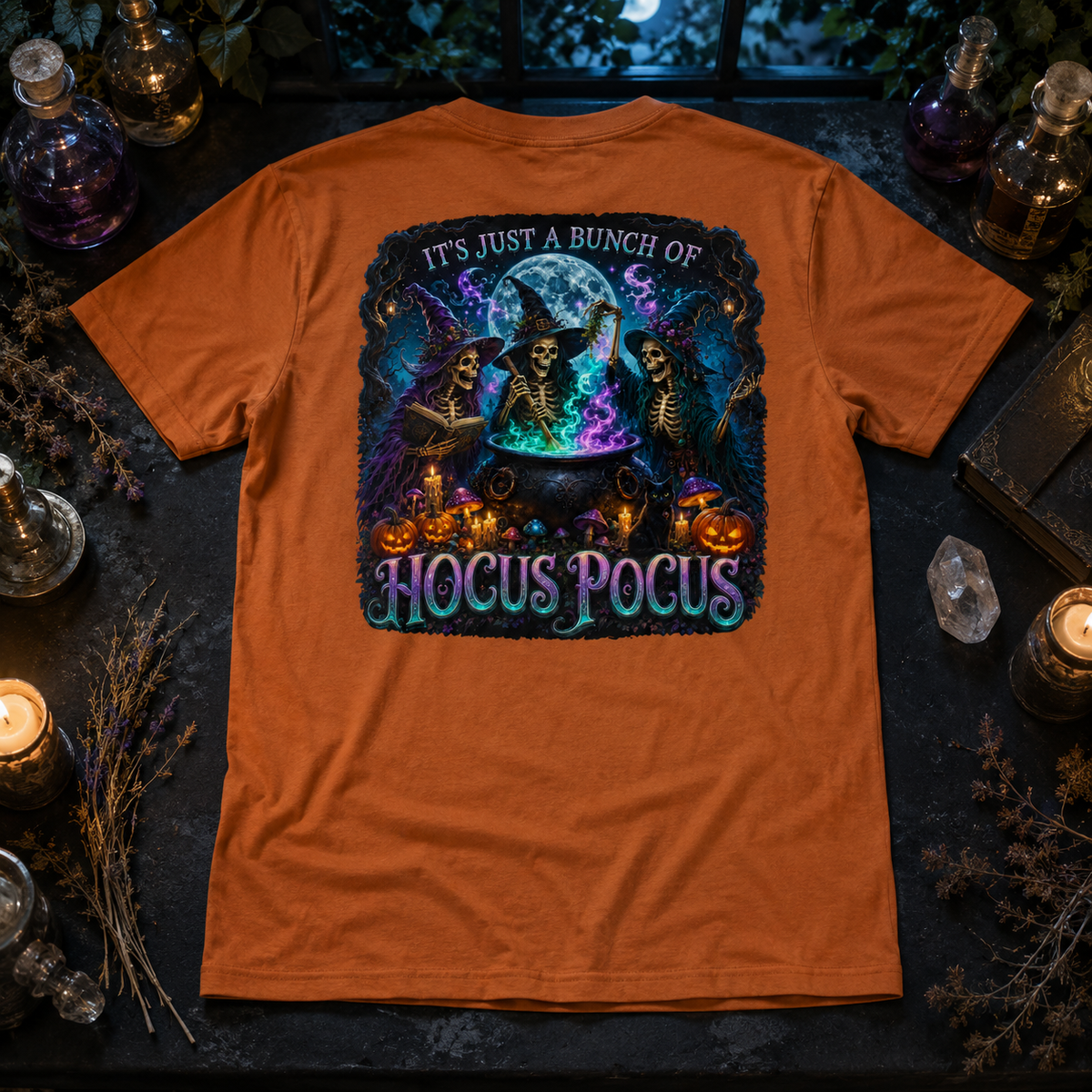 Autumn Hocus Pocus unisex graphic T-shirt back staged in a gothic apothecary flat lay